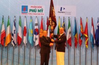 Ceremonial handing of the flag of the International Chemistry Olympiad to the representative of Azerbaijan