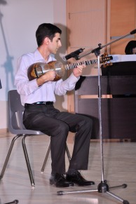 G. Mamedzadeh, a student of the Applied Mathematics Faculty playing the tar, national musical instrument